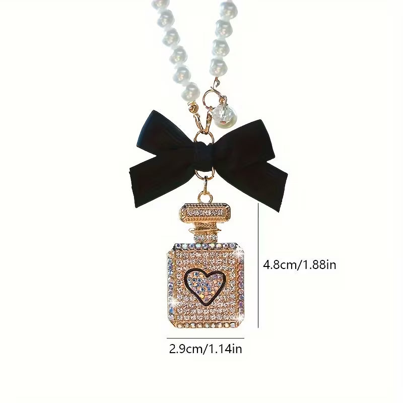Elegant Black Bow & Pearl Car Hanging Ornament - Sparkling Crystal Perfume Bottle Design, Golden-Tone Metal