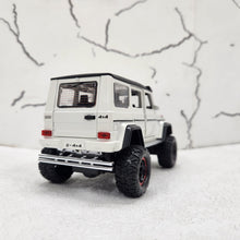 Load image into Gallery viewer, Mercedes G Wagon G500 Uplifted White Metal Diecast Car 1:32 (14x5 cm)