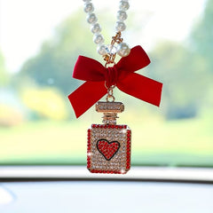 Elegant Black Bow & Pearl Car Hanging Ornament - Sparkling Crystal Perfume Bottle Design, Golden-Tone Metal