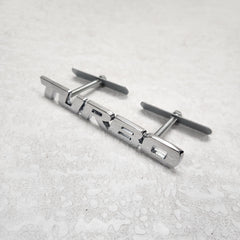 Turbo Silver Grille Metal Emblem (14.9 x 3.2 cm)