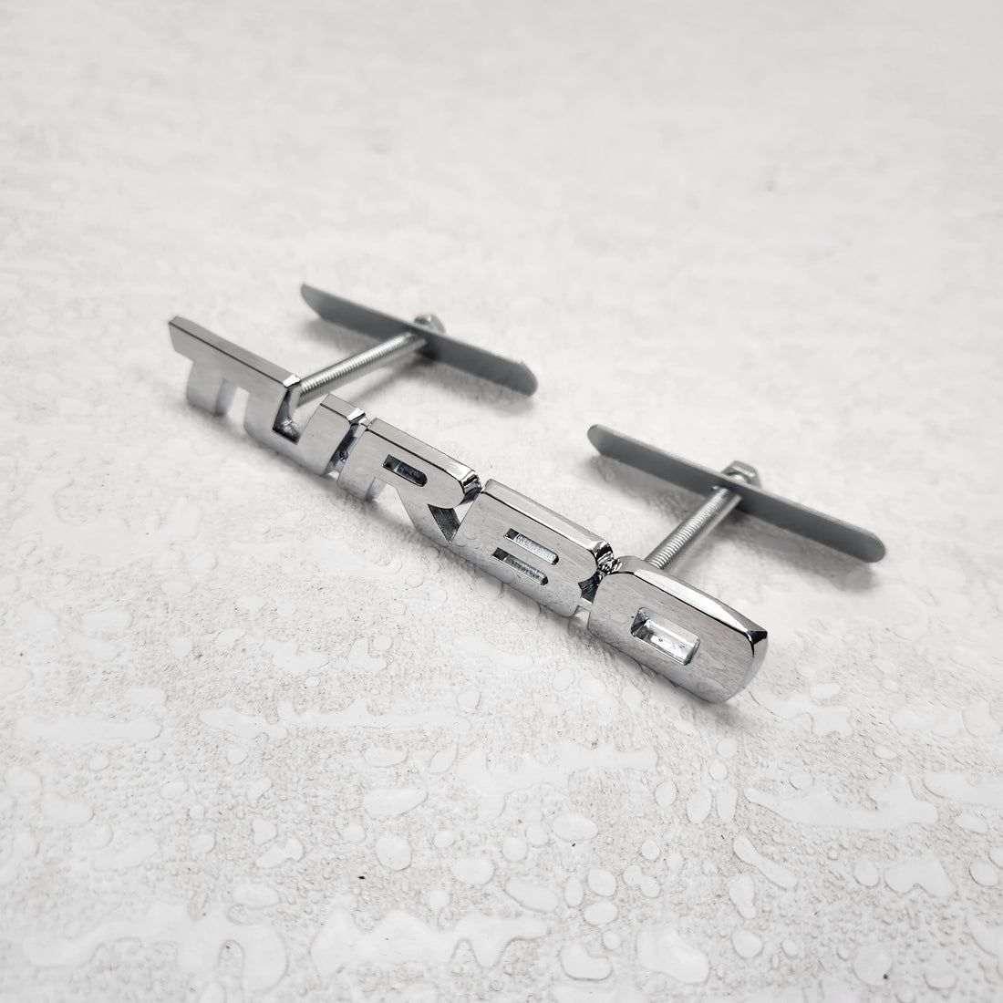 Turbo Silver Grille Metal Emblem (14.9 x 3.2 cm)