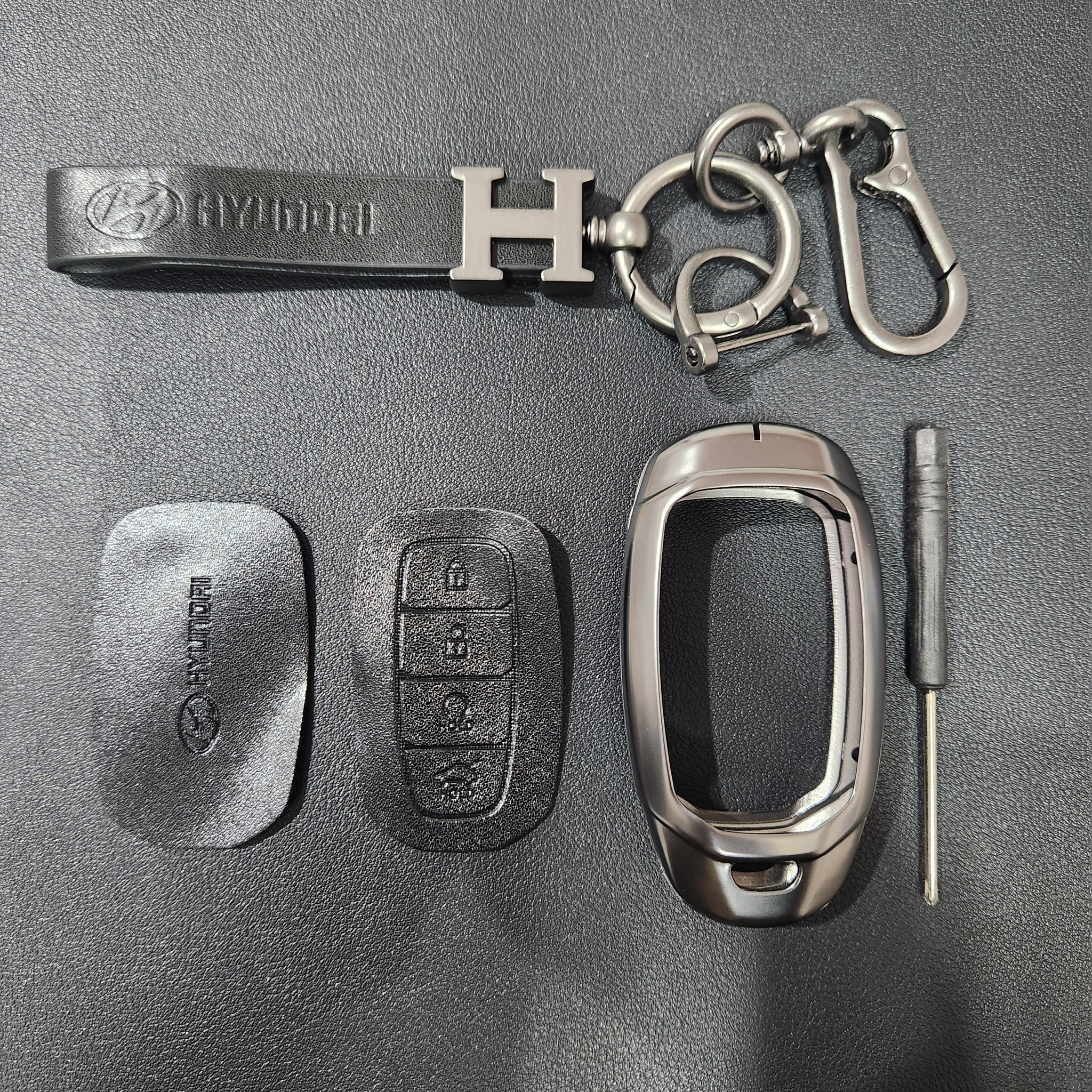 Hyundai Verna (4 Button) Key Luxury Metal Alloy Leather Keycase with Holder & Rope Chain