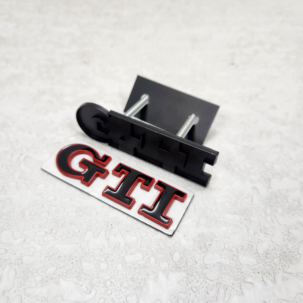 GTI Black/Red Grille Metal Emblem (9.1 x 2.7 cm)