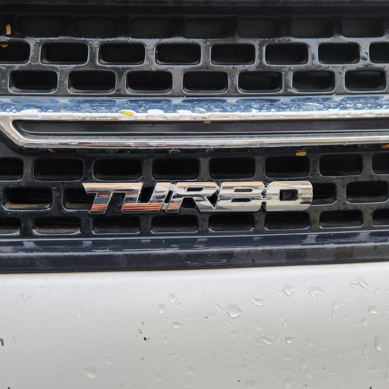 Turbo Silver Grille Metal Emblem (14.9 x 3.2 cm)